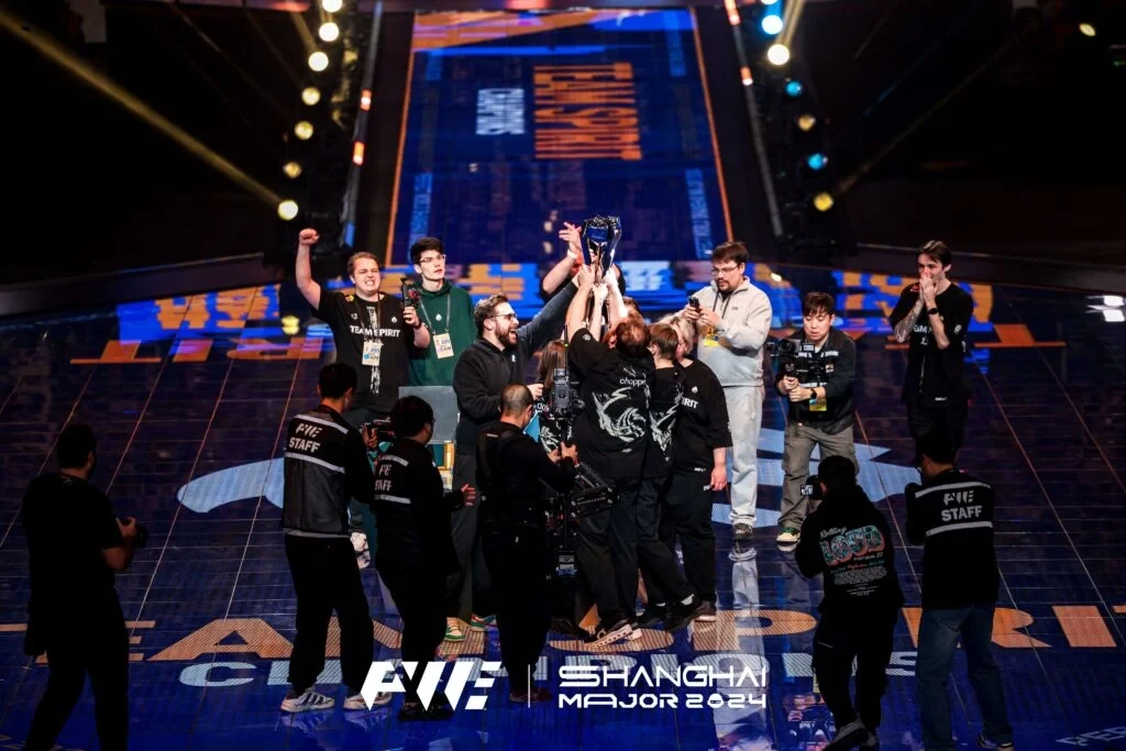 Spirit lifting the Shanghai Major trophy in 2024.