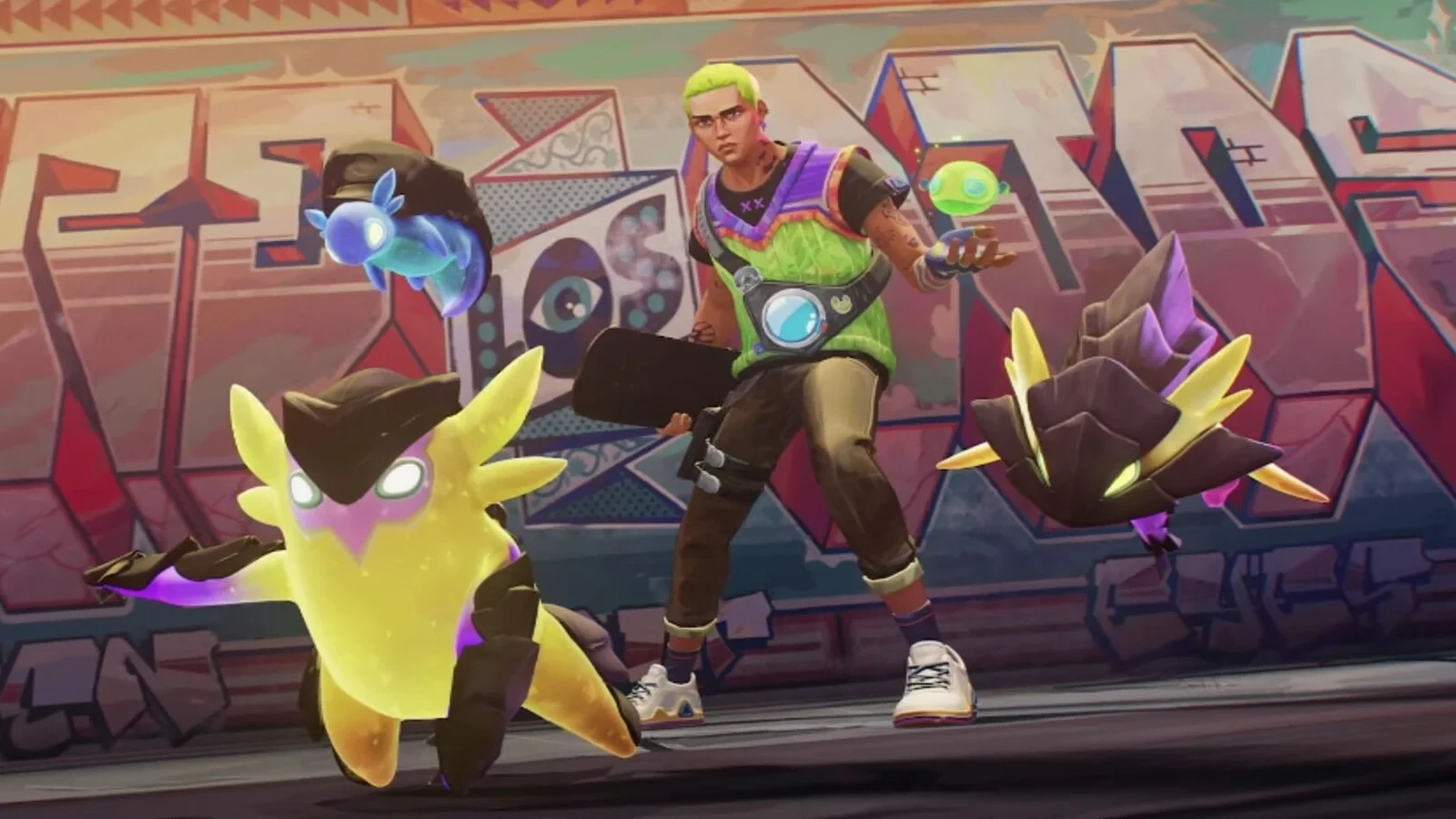 El agente de VALORANT Gekko con varias de sus criaturas tipo mascota frente a un fondo con graffiti.